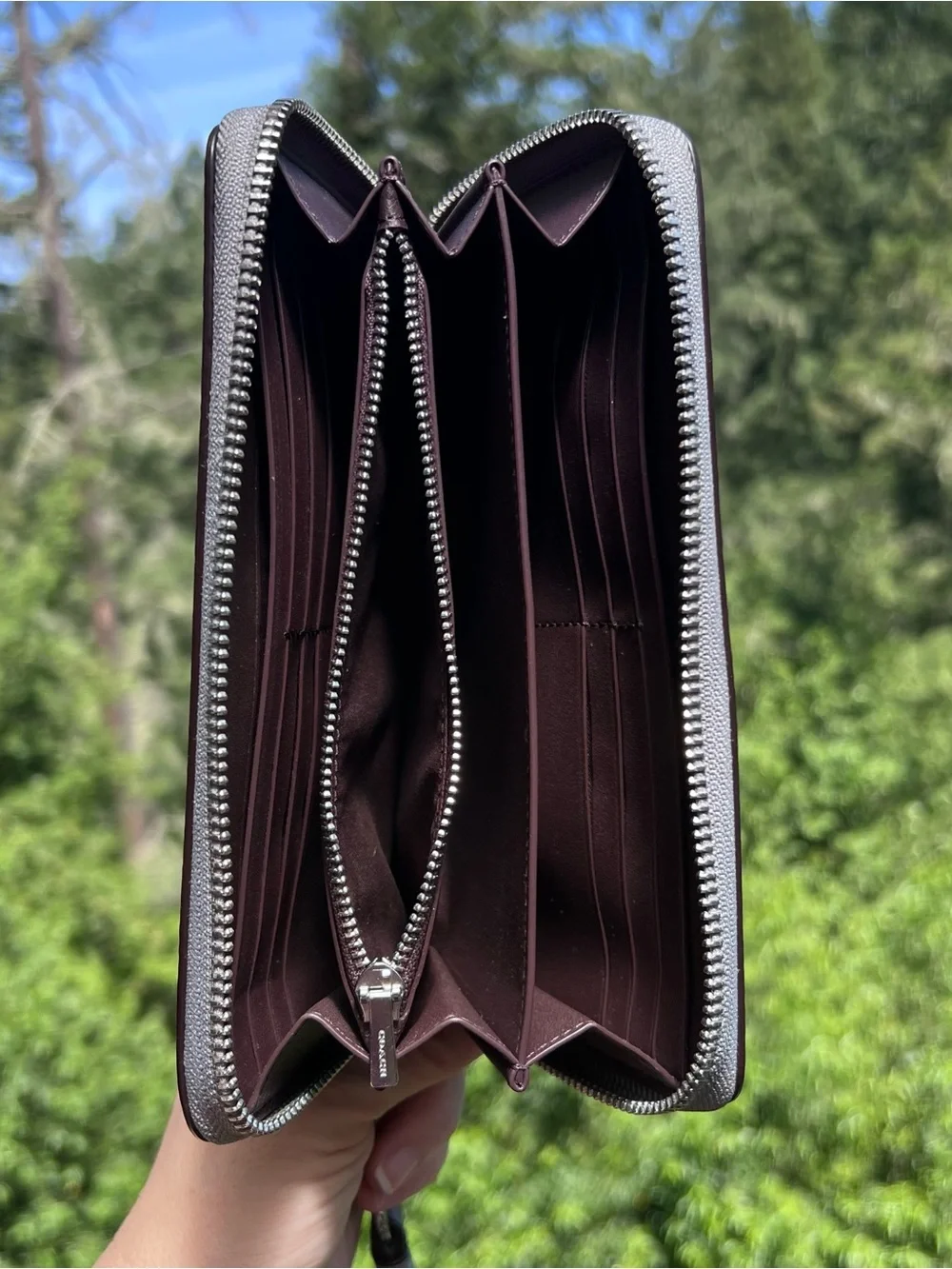 Coach accordion zip